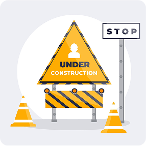 Under construction sign with cones