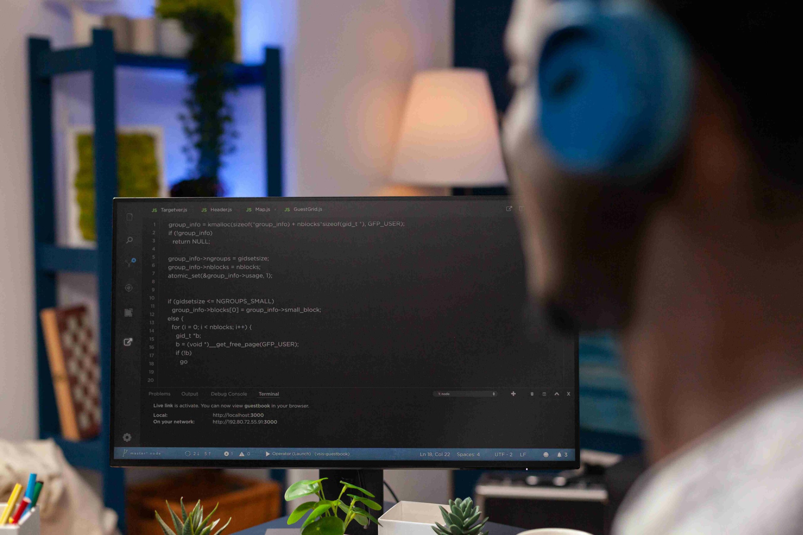 selective-focus-african-american-it-employee-with-headset-working-remote-from-home-website-design-using-programming-technologies-computer-programmer-man-coding-digital-business-server (1)