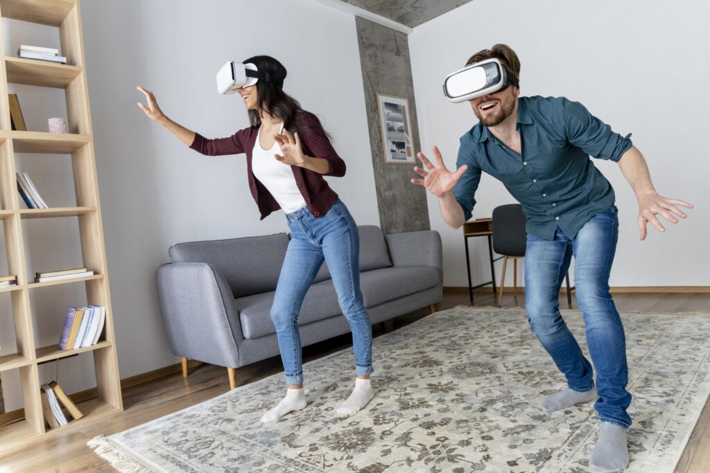 smiley-man-woman-having-fun-home-with-virtual-reality-headset