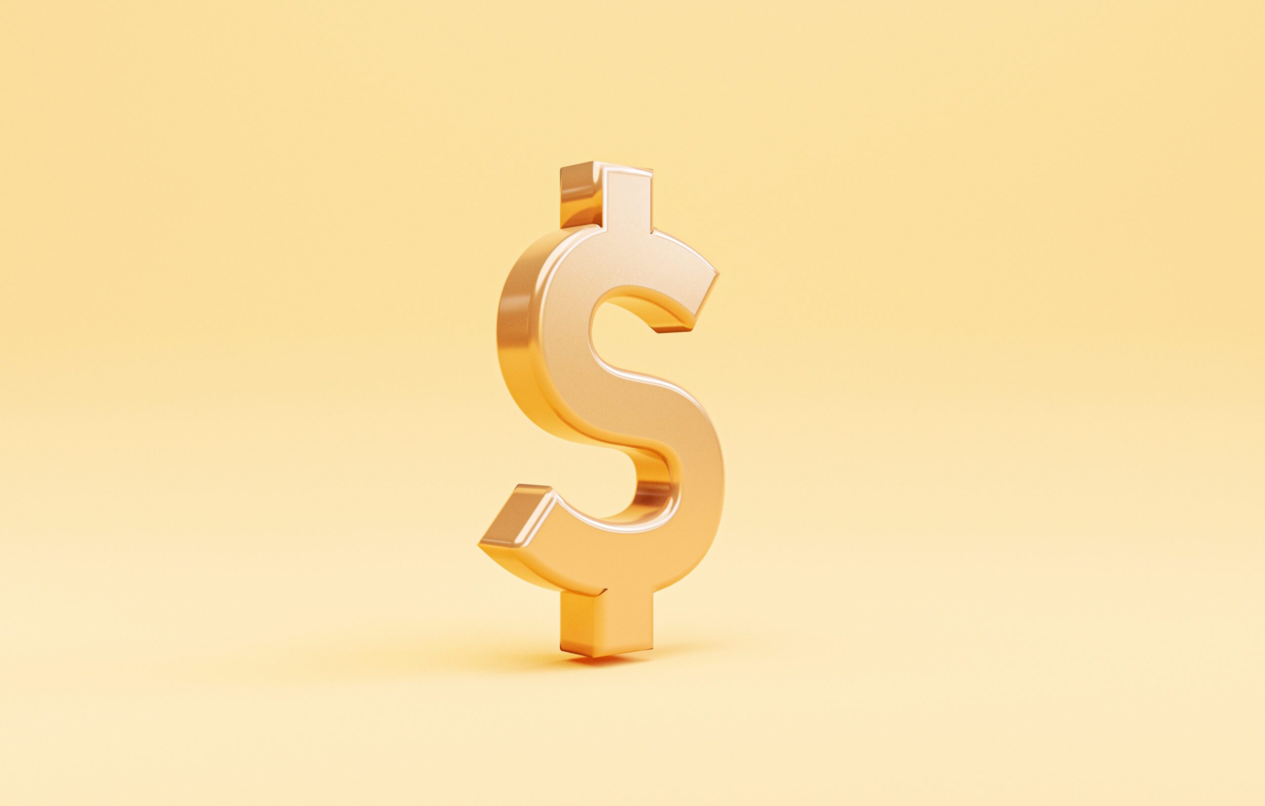 Golden US dollar or USD on yellow background , Dollar is the mai
