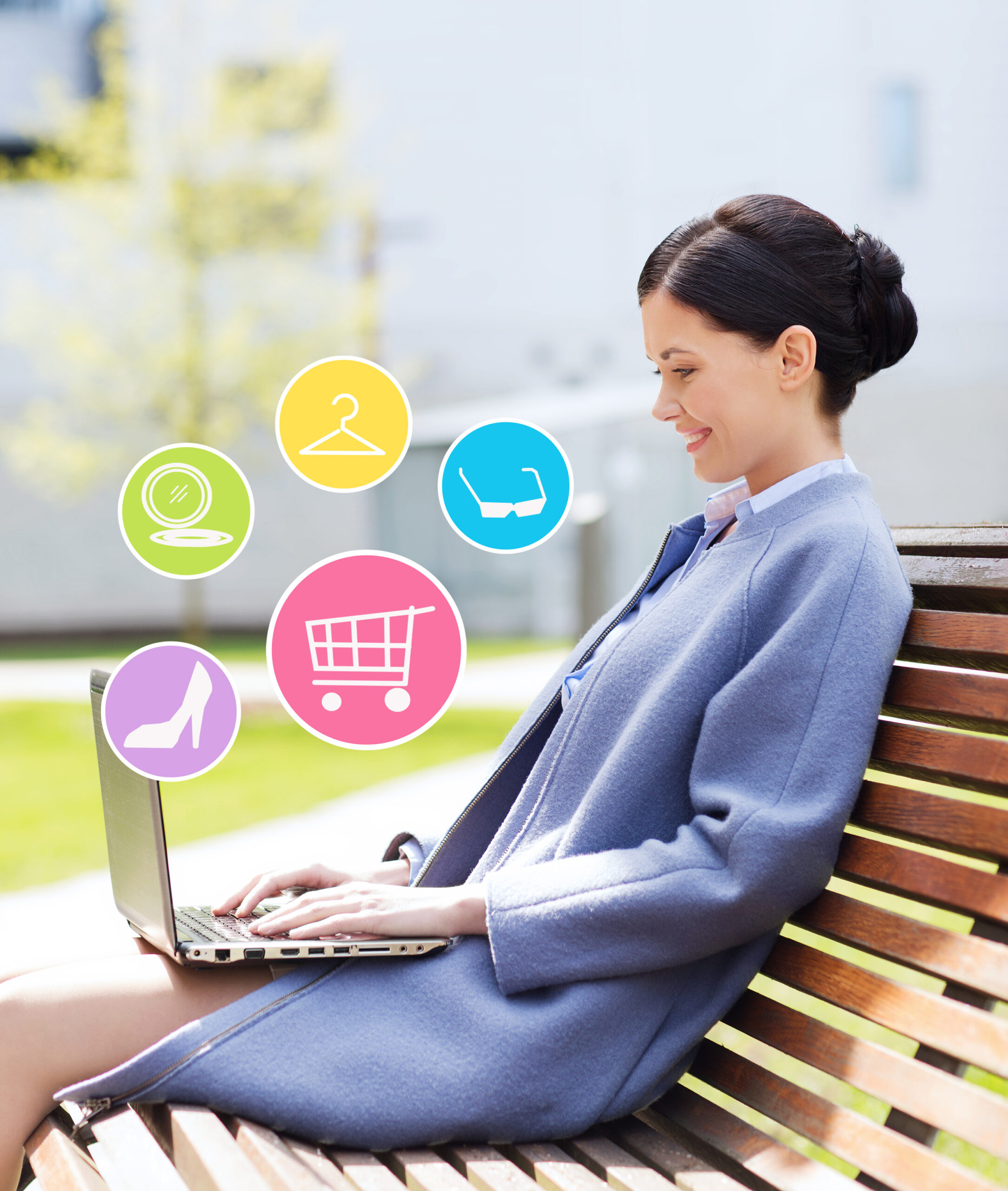smiling business woman with laptop in city